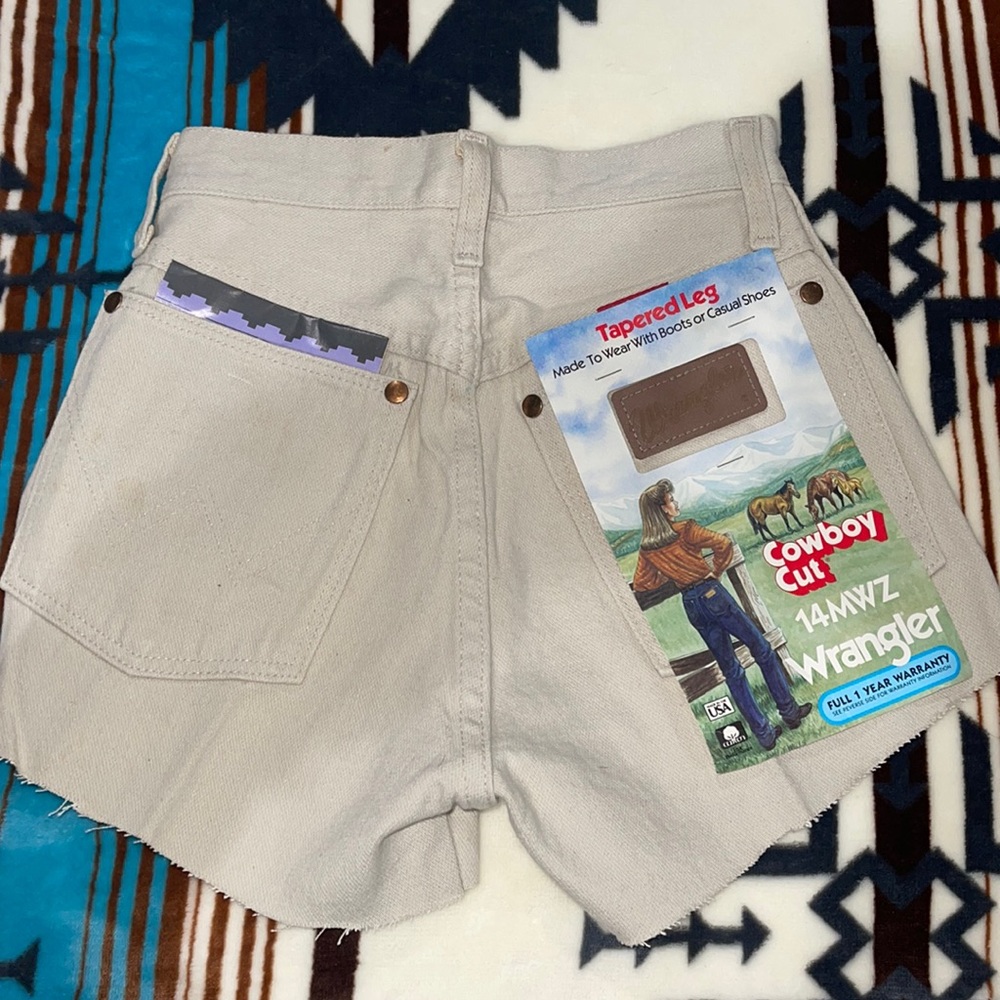 Cowboy cut, cutoff wrangler shorts